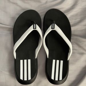 Brand new and never worn Adidas sandal.